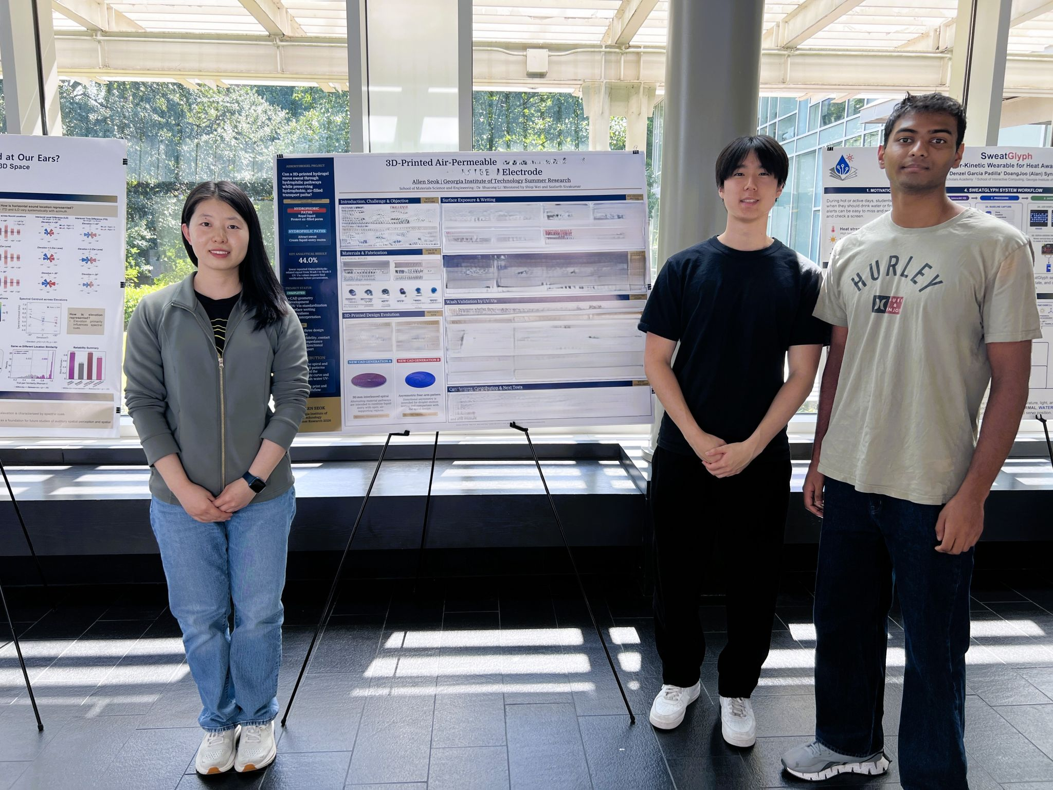 Shiqi Wei, Allen Seok, and a fellow student presenting the air-permeable hydrogel electrode project at the WISH poster session